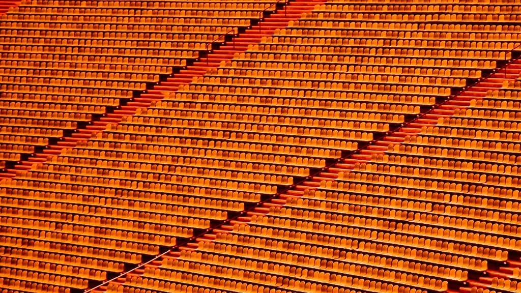 A stadium with fans and celebration